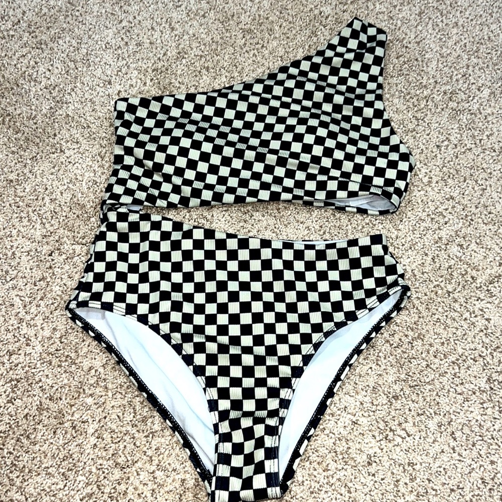 woman’s pink lily swim suit